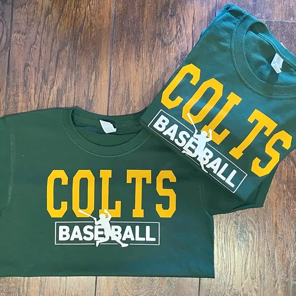 Two dark green Colts Baseball t-shirts printed in gold and white